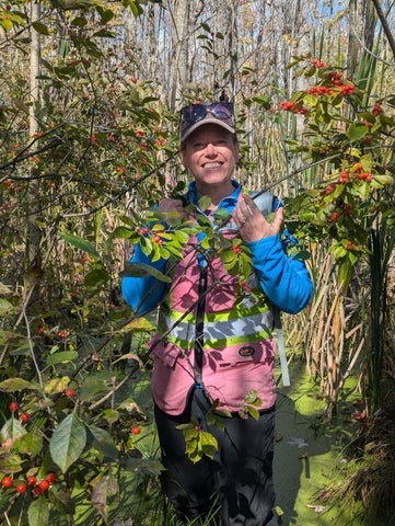 Maria Strack in a swamp.