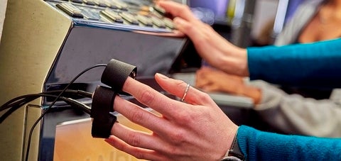 Photo of measurements being taken during slot machine play