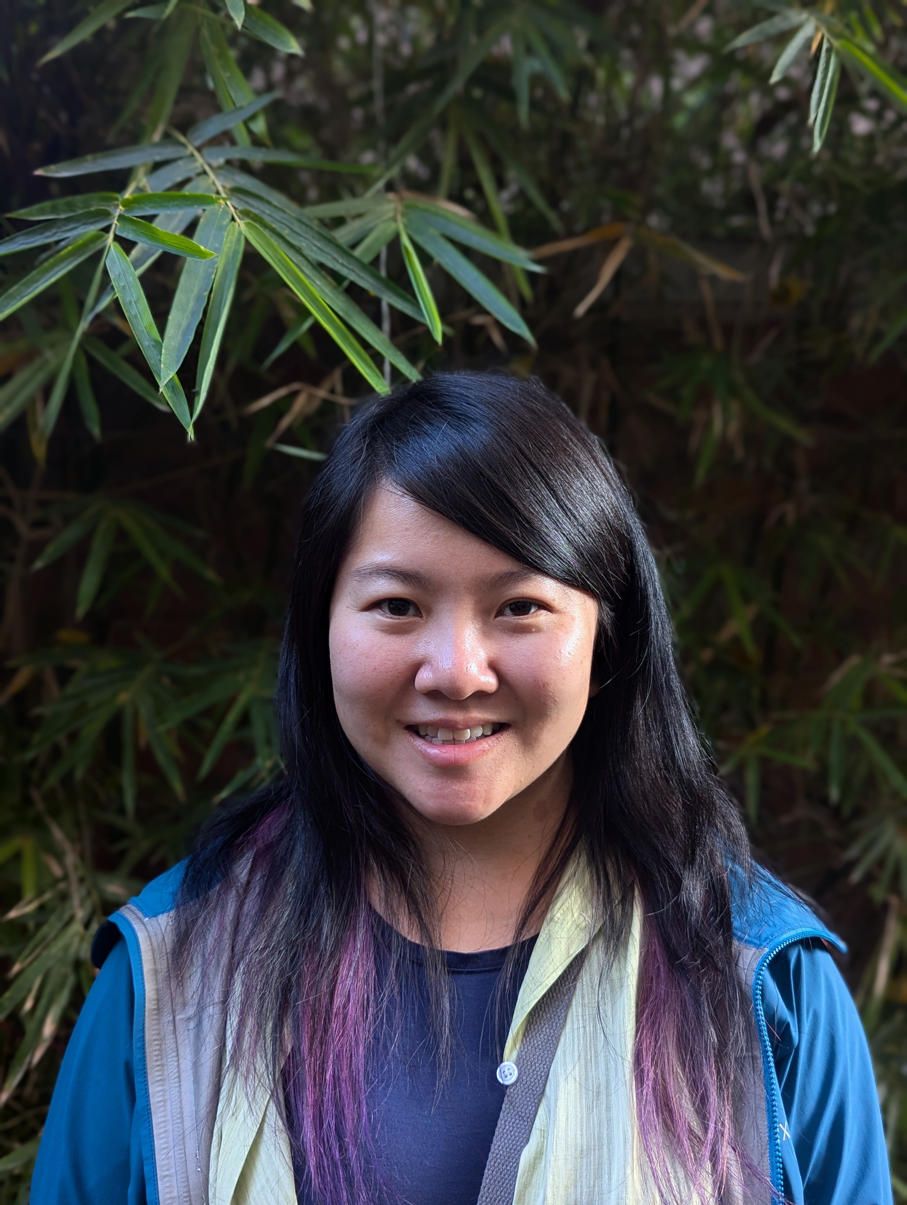 tara Chen wearing blue jacket, smiling at camera