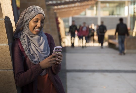 Student on her phone.